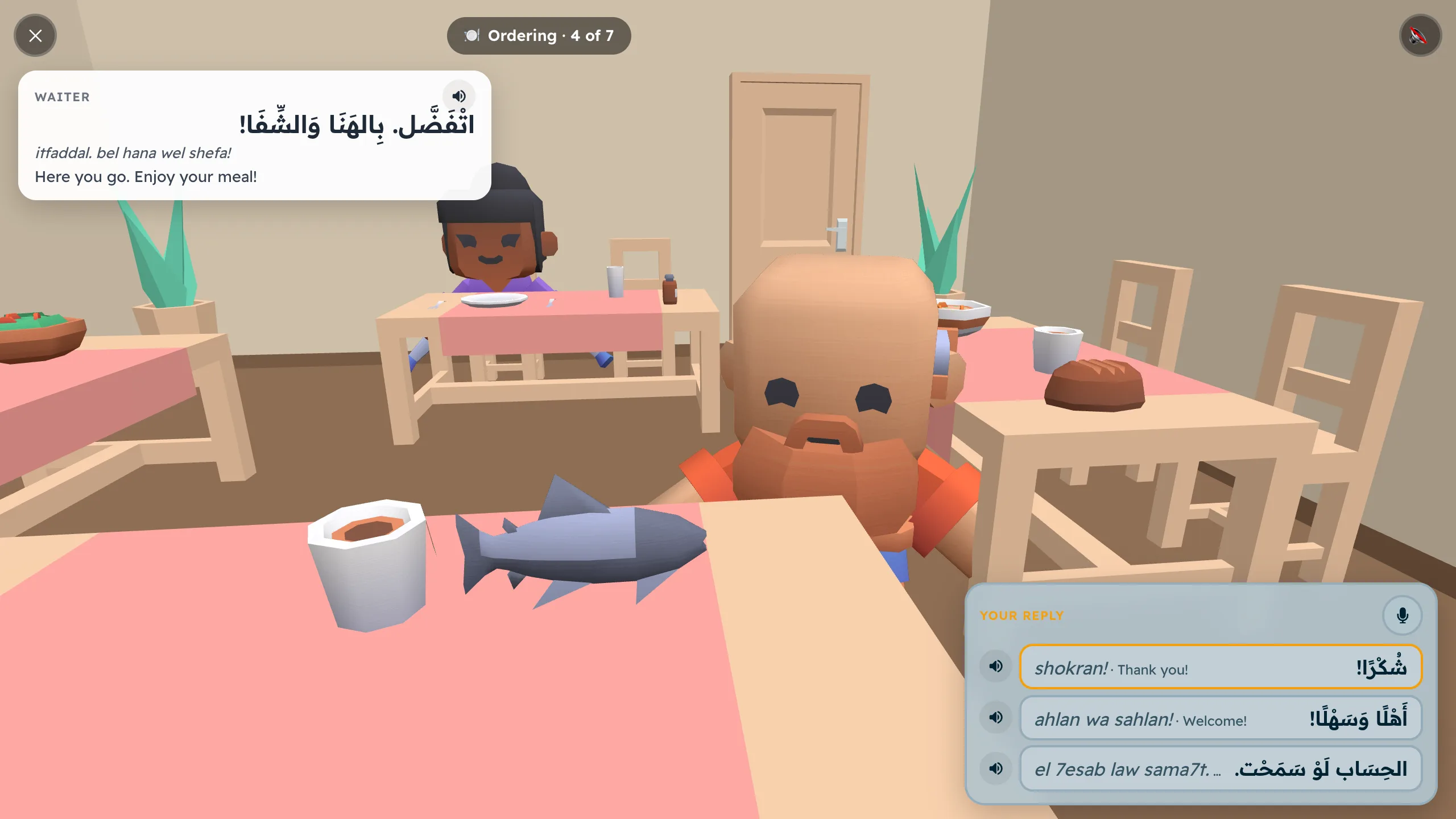 The waiter says here you go, enjoy your meal, in Egyptian Arabic, and the fish and tea are on the table